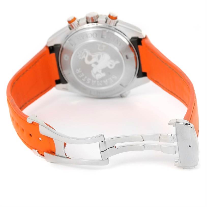 The image shows the back of an Omega Planet Ocean 2918.50.38 Men
s Stainless Steel Black Dial 2918.50.38 Men
s Stainless Steel Black Dial watch with an orange strap and stainless steel clasp. 