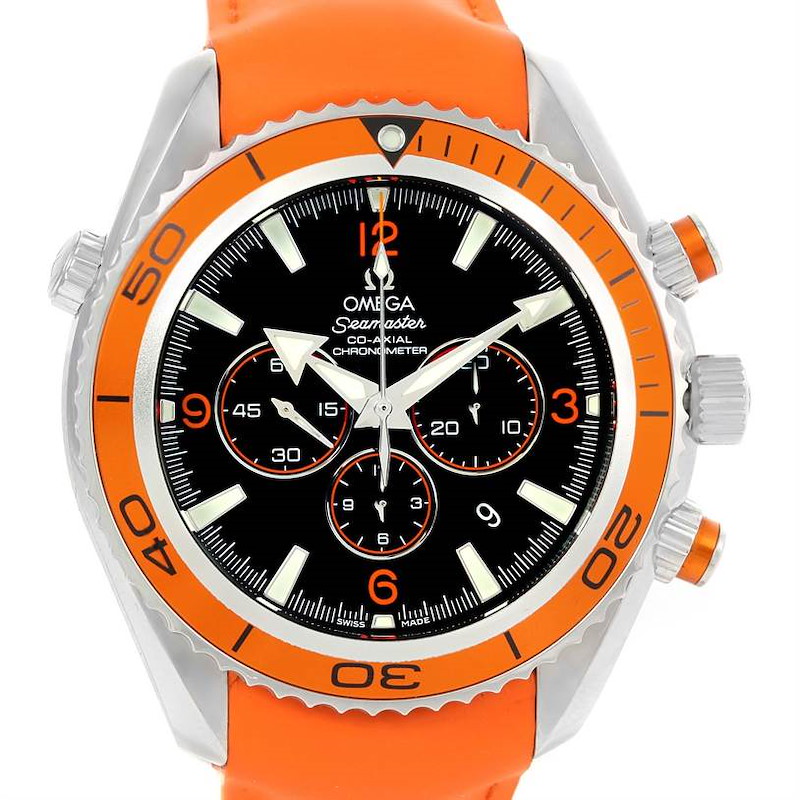 The Omega Planet Ocean watch is shown from the front, highlighting its orange bezel, black dial, and orange strap.