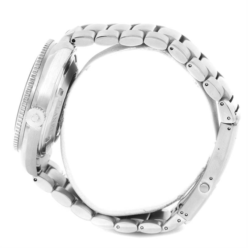 This side view of the Omega Planet Ocean 2201.50.00 Men
s Stainless Steel Black Dial 2201.50.00 Men
s Stainless Steel Black Dial watch shows the case, bezel, crown, and part of the metal bracelet.