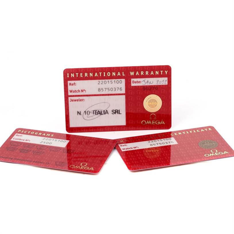 The image shows three warranty and certification cards for the Omega Planet Ocean 2201.50.00 Men
s Stainless Steel Black Dial 2201.50.00 Men
s Stainless Steel Black Dial model, photographed from above.