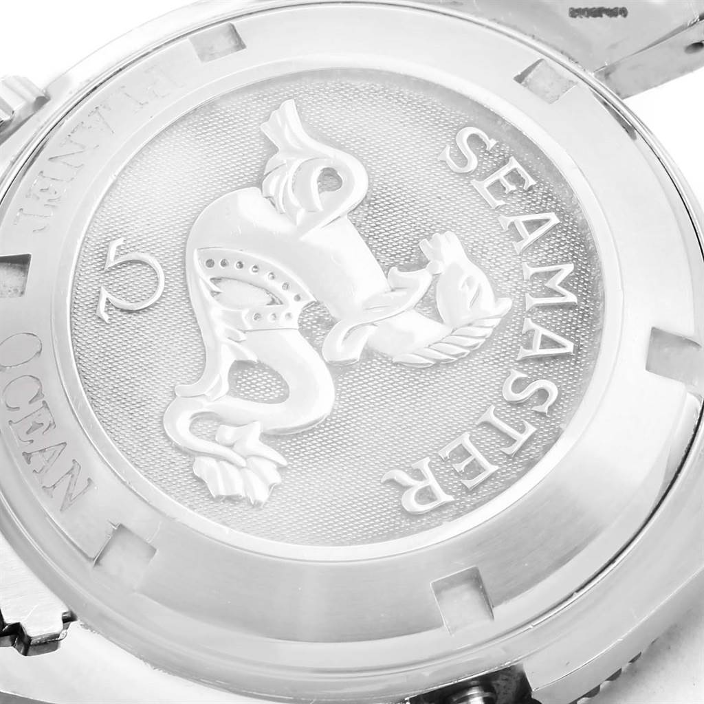 The image shows the case back of the Omega Planet Ocean 2209.50.00 Men
s Stainless Steel Black Dial 2209.50.00 Men
s Stainless Steel Black Dial Seamaster watch at an oblique angle.