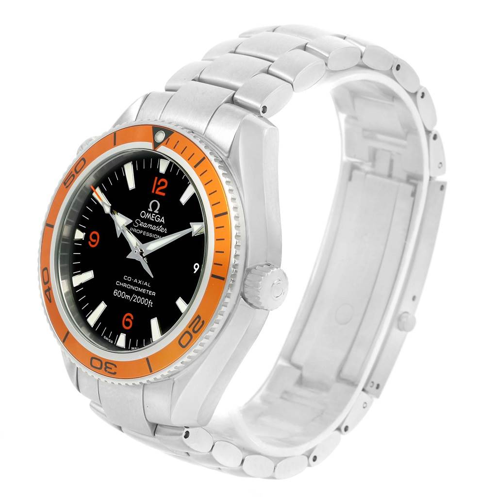 The image shows an Omega Seamaster Planet Ocean watch at a 3/4 angle, displaying the dial, bezel, case, crown, and part of the bracelet.