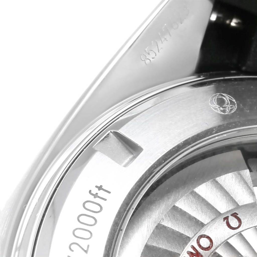 This image shows a close-up angle of the case back of an Omega Planet Ocean 232.32.46.21.01.003 Men
s Stainless Steel Black Dial 232.32.46.21.01.003 Men
s Stainless Steel Black Dial watch, displaying part of the movement and depth rating.