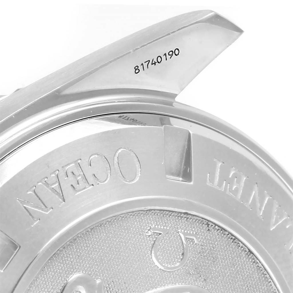 The image shows a close-up of the back case and lug of an Omega Planet Ocean 2208.50.00 Men
s Stainless Steel Black Dial 2208.50.00 Men
s Stainless Steel Black Dial watch, with the serial number visible.