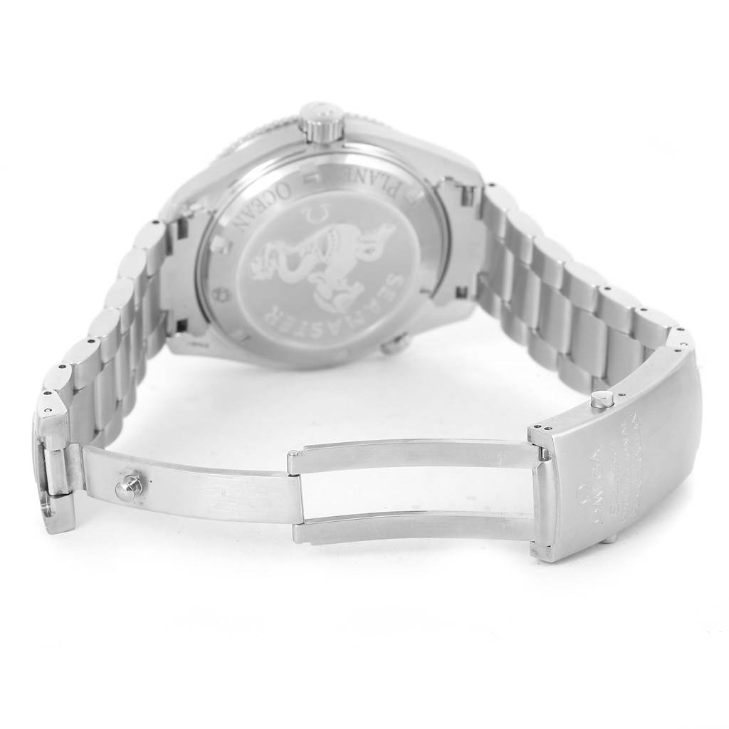 The image shows the back and clasp of the Omega Planet Ocean 2209.50.00 Men's Stainless Steel Black Dial 2209.50.00 Men's Stainless Steel Black Dial watch, highlighting the stainless steel bracelet and engraved case back.