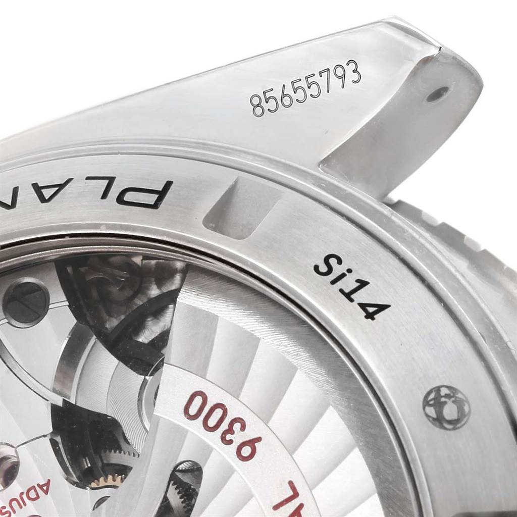 The image shows a close-up of the case back and serial number of an Omega Planet Ocean 232.90.46.51.03.001 Men's Titanium Blue Dial 232.90.46.51.03.001 Men's Titanium Blue Dial watch model.