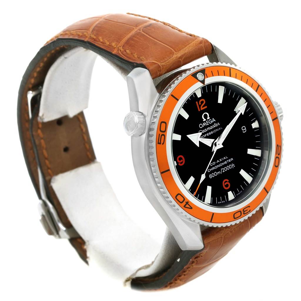 This Omega Planet Ocean 2909.50.38 Men
s Stainless Steel Black Dial 2909.50.38 Men
s Stainless Steel Black Dial watch is shown from a side angle, highlighting the orange bezel, black dial, and brown leather strap.