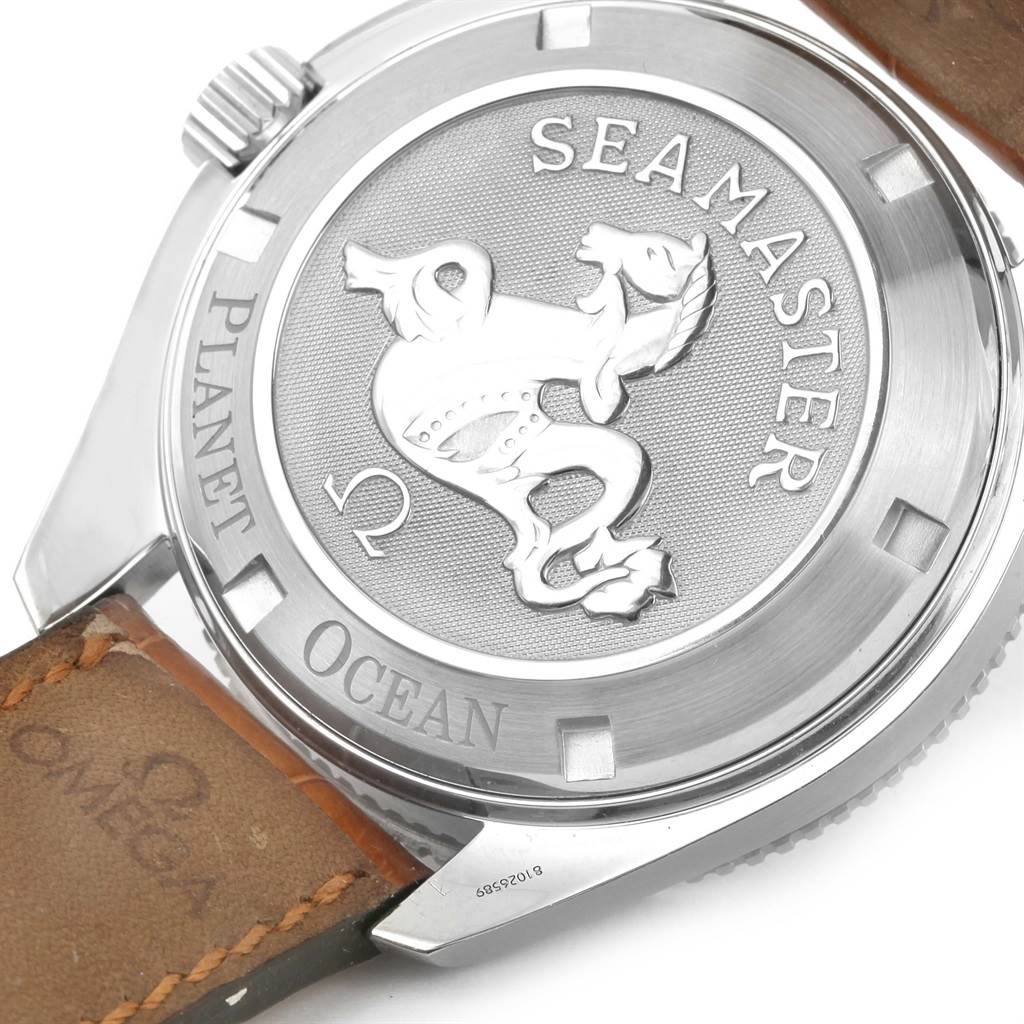 This image shows the case back of the Omega Planet Ocean 2909.50.38 Men
s Stainless Steel Black Dial 2909.50.38 Men
s Stainless Steel Black Dial watch with its leather strap partially visible.