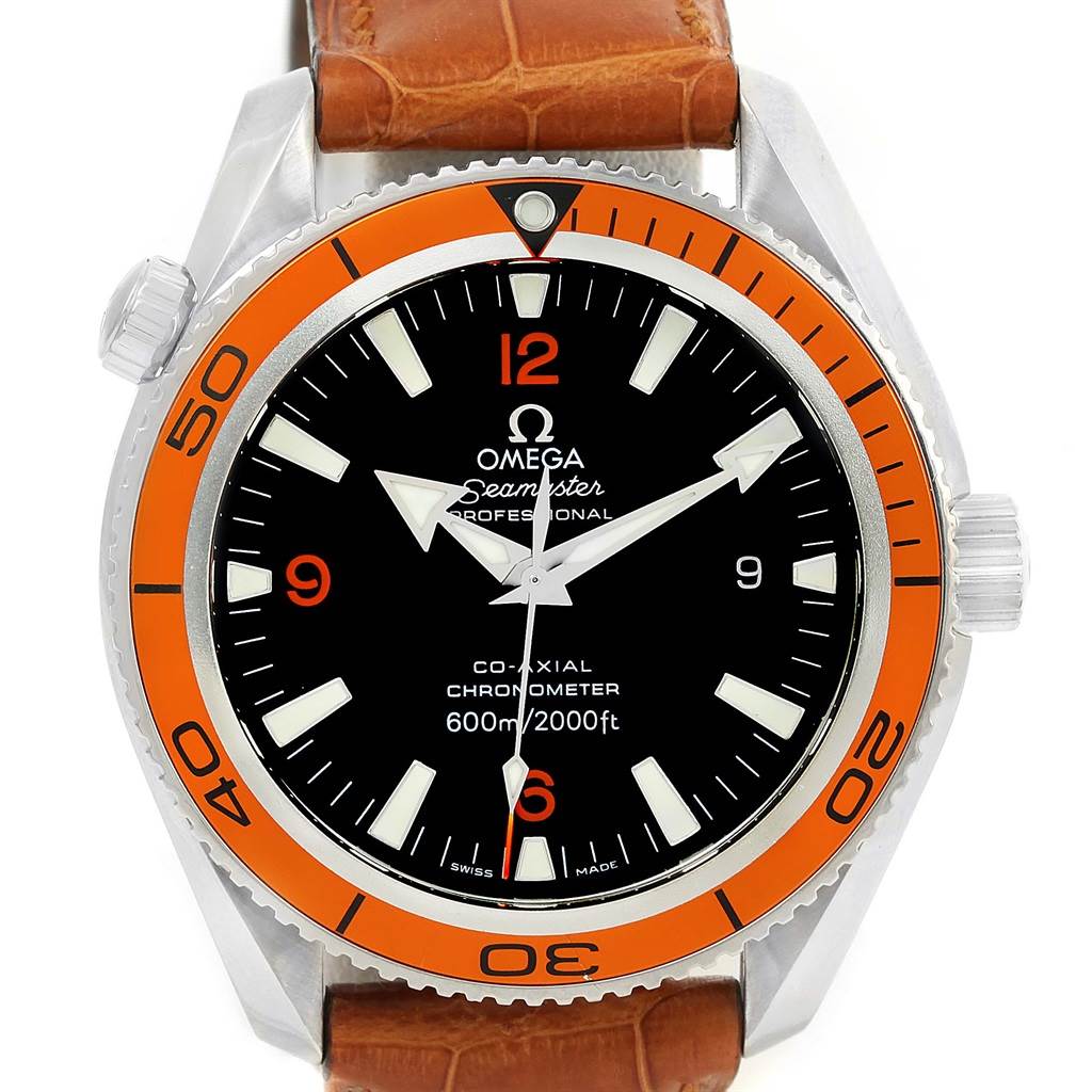 The image shows a front view of the Omega Planet Ocean 2909.50.38 Men
s Stainless Steel Black Dial 2909.50.38 Men
s Stainless Steel Black Dial watch, highlighting its orange bezel, black dial, and brown leather strap.