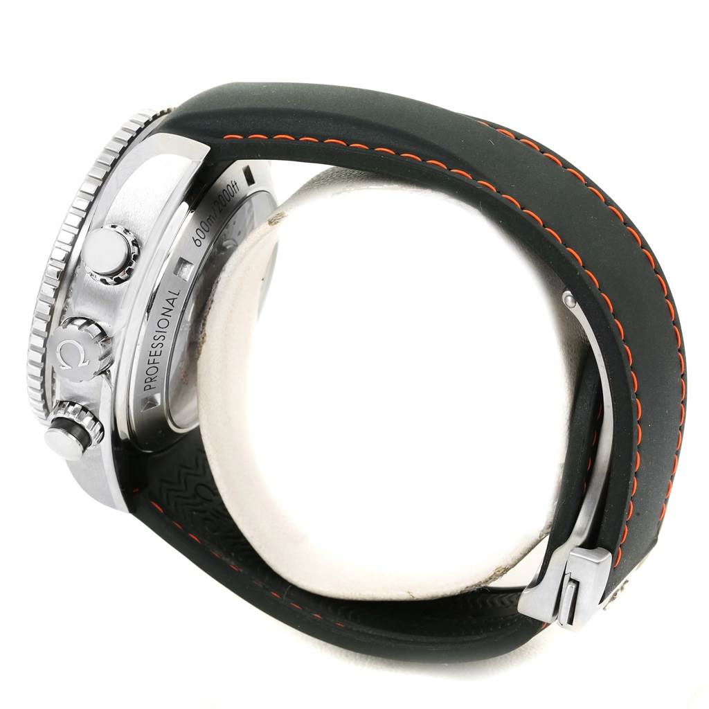 The image shows a side view of the Omega Planet Ocean 232.32.46.51.01.005 Men
s Stainless Steel Black Dial 232.32.46.51.01.005 Men
s Stainless Steel Black Dial watch, highlighting the crown, bezel, and part of the strap with orange stitching.