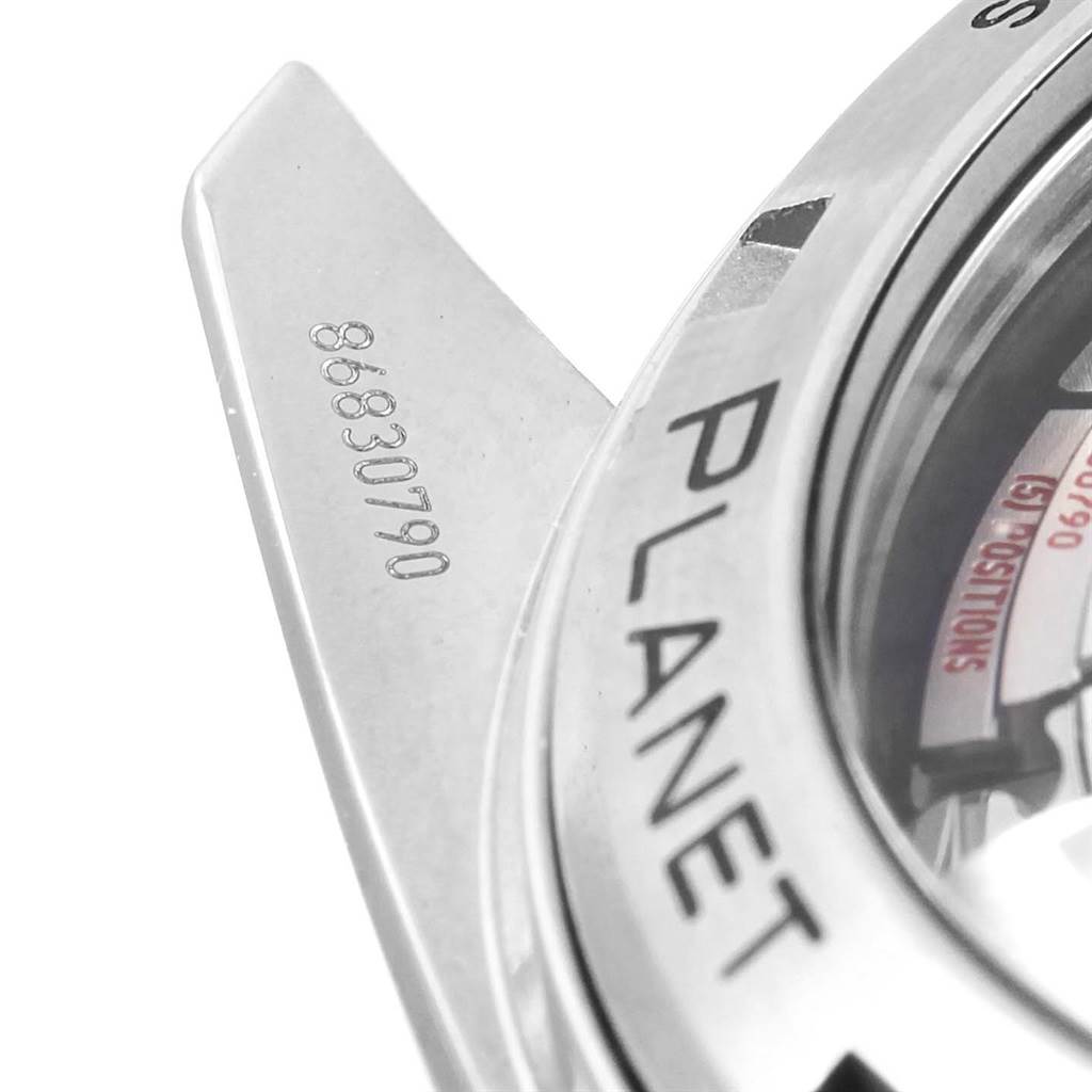 The image shows a close-up angle of the Omega Planet Ocean 232.30.44.22.03.001 Men's Stainless Steel Blue Dial 232.30.44.22.03.001 Men's Stainless Steel Blue Dial watch's case, bezel, and part of a lug with a serial number.