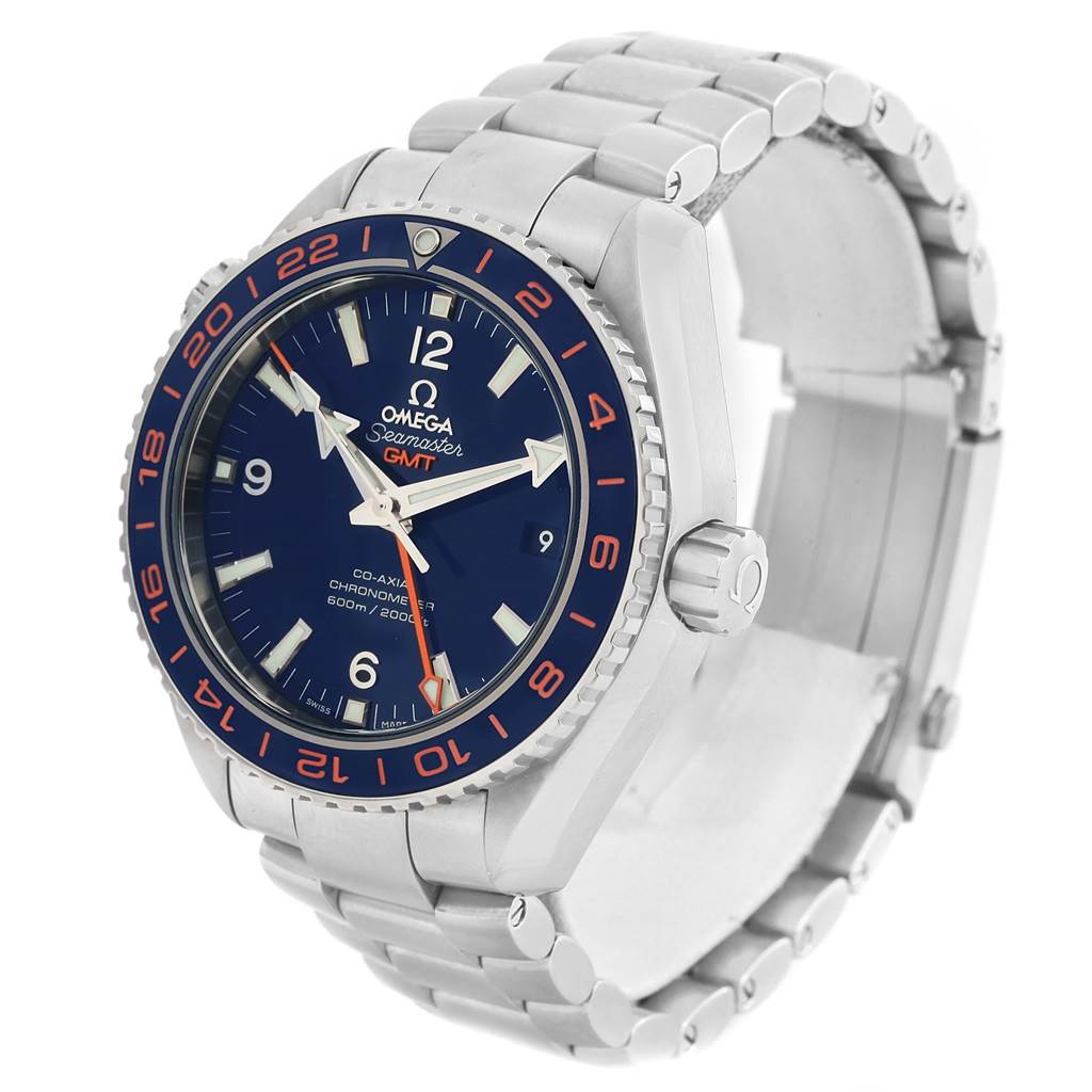 The image shows the Omega Planet Ocean 232.30.44.22.03.001 Men's Stainless Steel Blue Dial 232.30.44.22.03.001 Men's Stainless Steel Blue Dial watch at an angle highlighting the watch face, bezel, crown, and part of the metal bracelet.