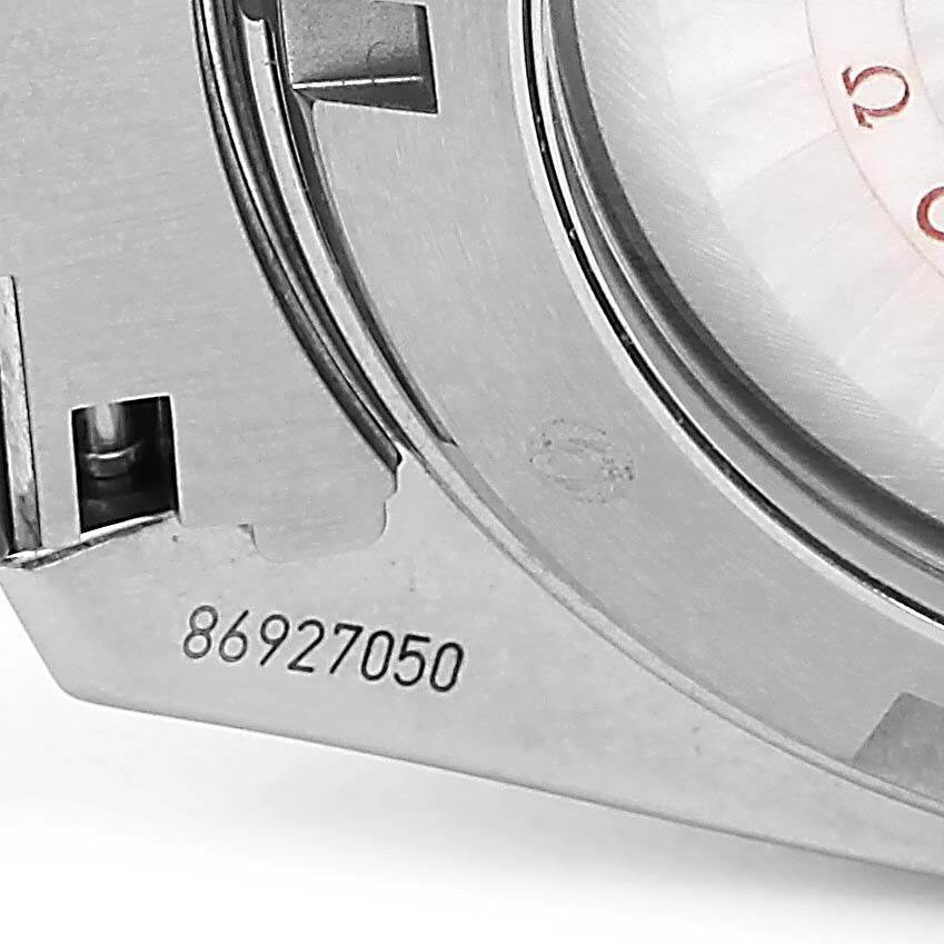 The image shows a partial view of the watch case back of the Omega Planet Ocean 232.30.46.21.01.002 Men
s Stainless Steel Black Dial 232.30.46.21.01.002 Men
s Stainless Steel Black Dial model, including a visible serial number.