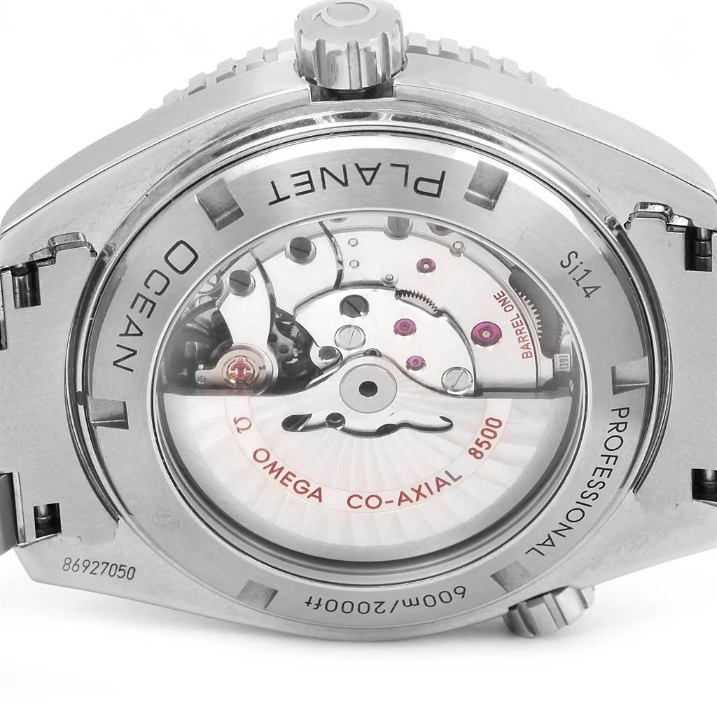 The image shows the back view of an Omega Planet Ocean 232.30.46.21.01.002 Men
s Stainless Steel Black Dial 232.30.46.21.01.002 Men
s Stainless Steel Black Dial watch, highlighting its internal mechanical components.