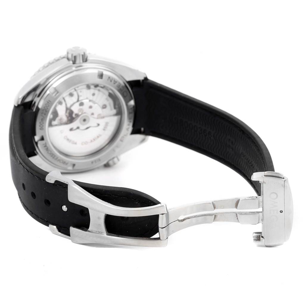 This image shows the back of the Omega Planet Ocean 232.32.46.21.01.003 Men
s Stainless Steel Black Dial 232.32.46.21.01.003 Men
s Stainless Steel Black Dial watch, highlighting the movement and the clasp of its rubber strap.