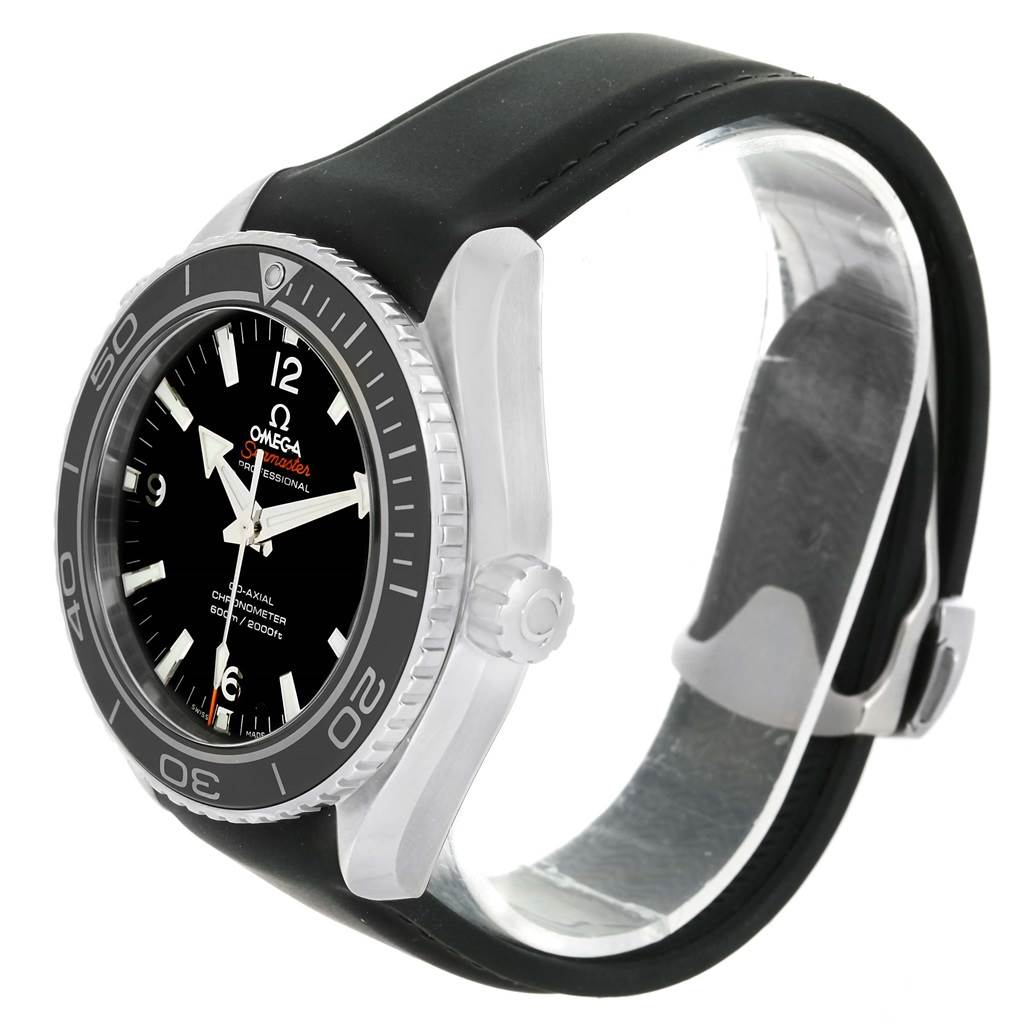 The image shows a side angle view of an Omega Planet Ocean 232.32.46.21.01.003 Men
s Stainless Steel Black Dial 232.32.46.21.01.003 Men
s Stainless Steel Black Dial watch, focusing on the bezel, crown, and black strap.