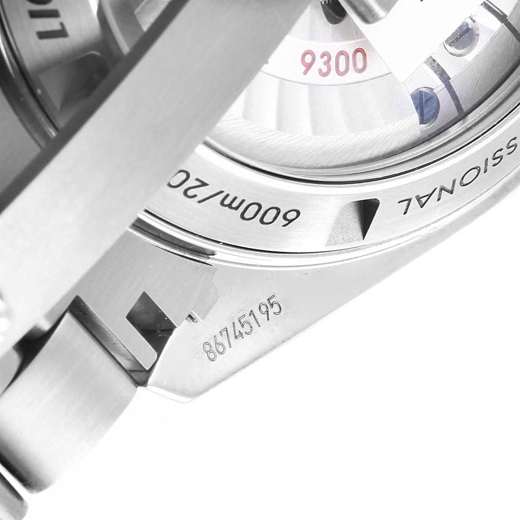 The image shows a close-up angle of the back case and part of the bracelet of the Omega Planet Ocean 232.90.46.51.03.001 Men
s Titanium Blue Dial 232.90.46.51.03.001 Men
s Titanium Blue Dial watch, highlighting the serial number and water resistance.