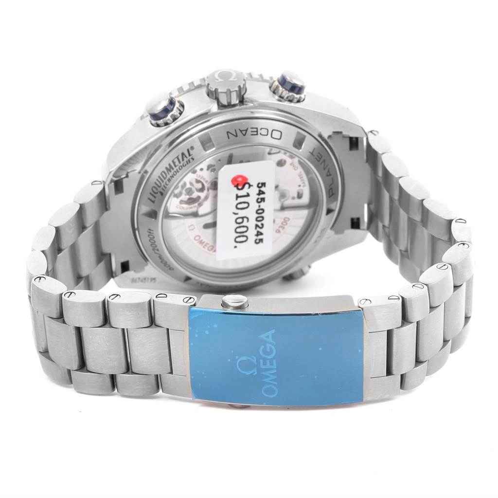 The image shows the back view of the Omega Planet Ocean 232.90.46.51.03.001 Men
s Titanium Blue Dial 232.90.46.51.03.001 Men
s Titanium Blue Dial watch, highlighting its case back, bracelet, and clasp.