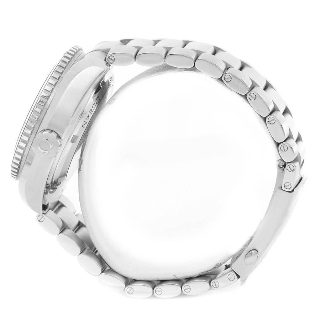 The image shows a side view of the Omega Planet Ocean 232.30.44.22.01.002 Men
s Stainless Steel Black Dial 232.30.44.22.01.002 Men
s Stainless Steel Black Dial watch, focusing on the case, bezel, and the metal bracelet.