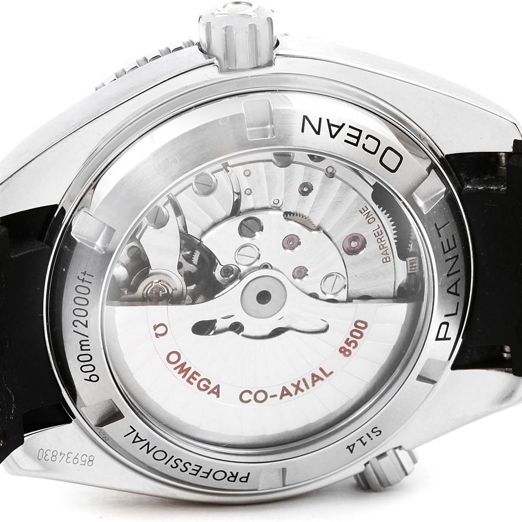 The image shows the back angle of an Omega Planet Ocean 232.32.42.21.01.005 Men
s Stainless Steel Black Dial 232.32.42.21.01.005 Men
s Stainless Steel Black Dial watch, highlighting the transparent case back revealing the Omega Co-Axial 8500 movement.