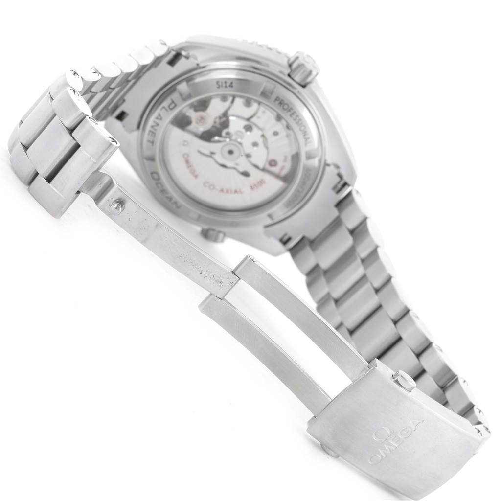 The image shows the back view of an Omega Planet Ocean 232.30.46.21.01.001 Men
s Stainless Steel Black Dial 232.30.46.21.01.001 Men
s Stainless Steel Black Dial watch, highlighting the transparent case back and the metal bracelet with clasp.