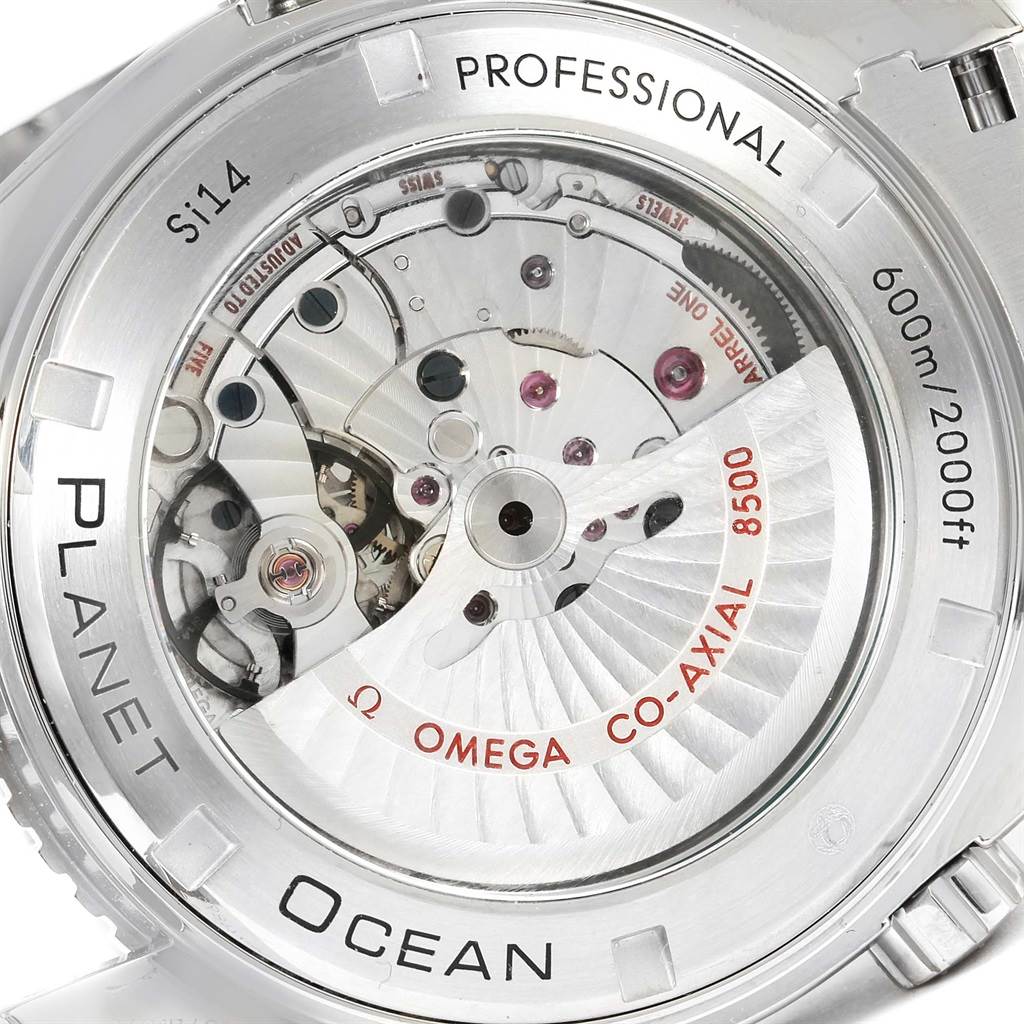 This image shows the back view of the Omega Planet Ocean 232.30.46.21.01.001 Men
s Stainless Steel Black Dial 232.30.46.21.01.001 Men
s Stainless Steel Black Dial watch, revealing its internal mechanics and engraving details.