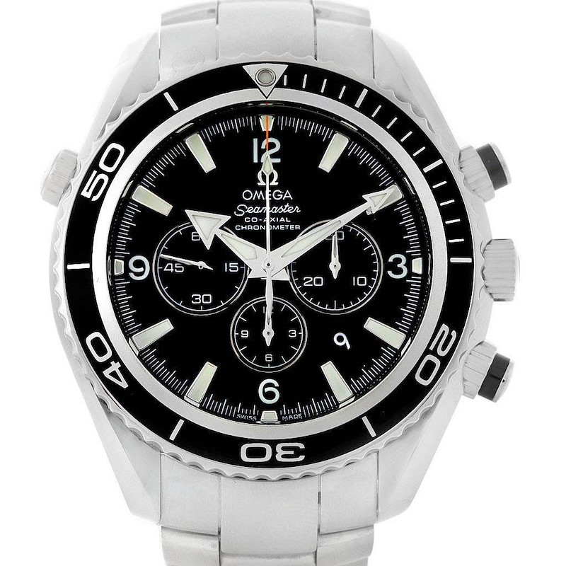 The image shows the front view of the Omega Planet Ocean model, highlighting its black dial and bezel, chronograph sub-dials, and stainless steel bracelet.