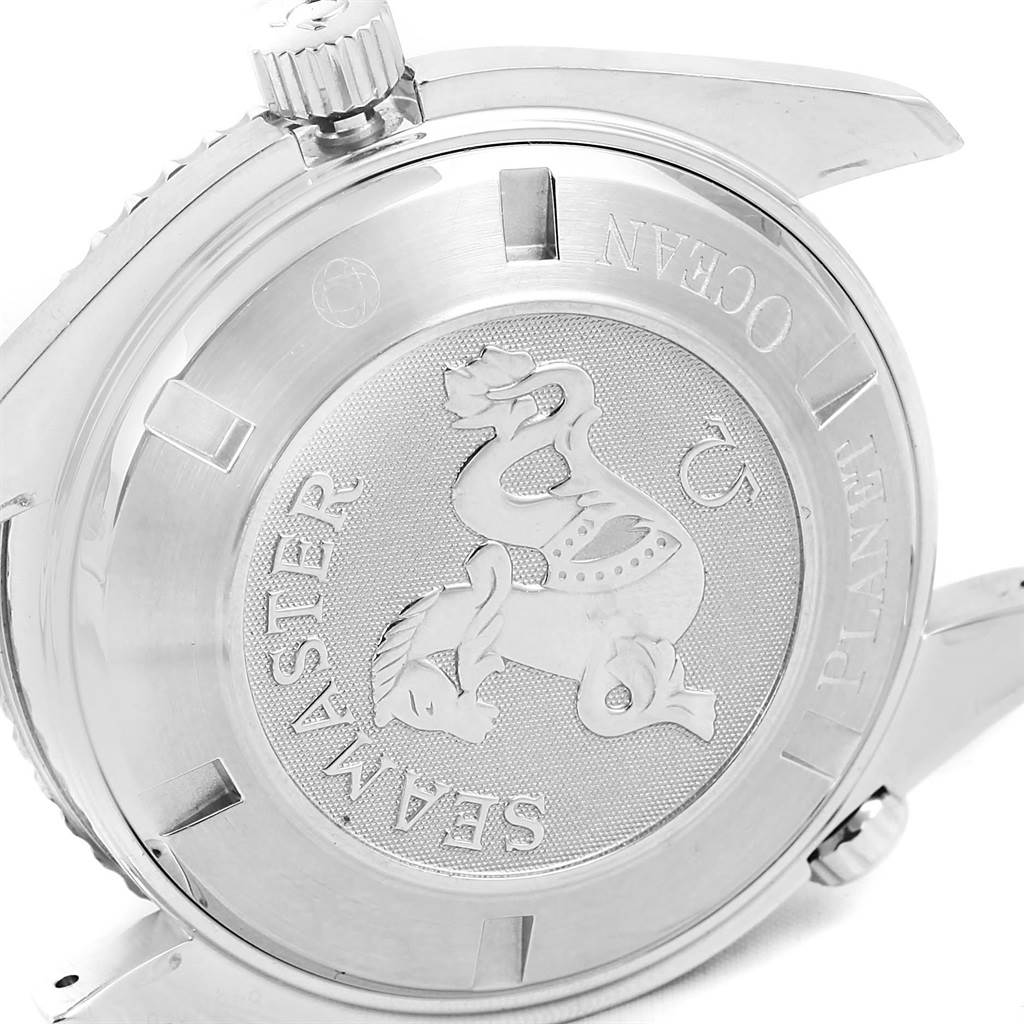 This image shows the back case and crown of an Omega Planet Ocean 2200.50.00 Men's Stainless Steel Black Dial 2200.50.00 Men's Stainless Steel Black Dial Seamaster watch, highlighting the engraved logo and text.