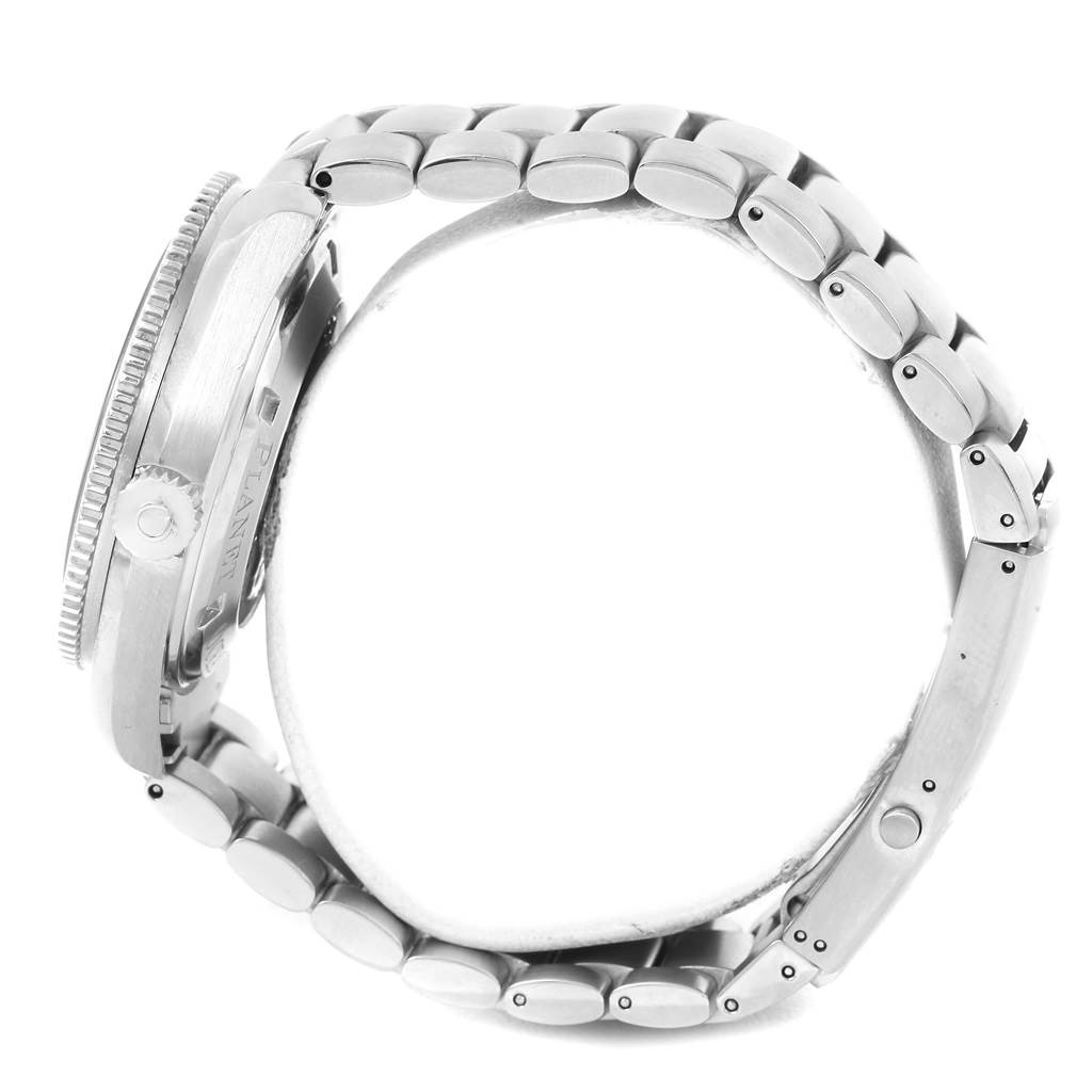 This image shows a side view of the Omega Planet Ocean 2200.51.00 Men
s Stainless Steel Black Dial 2200.51.00 Men
s Stainless Steel Black Dial model watch, highlighting the crown, bezel, and metal bracelet.