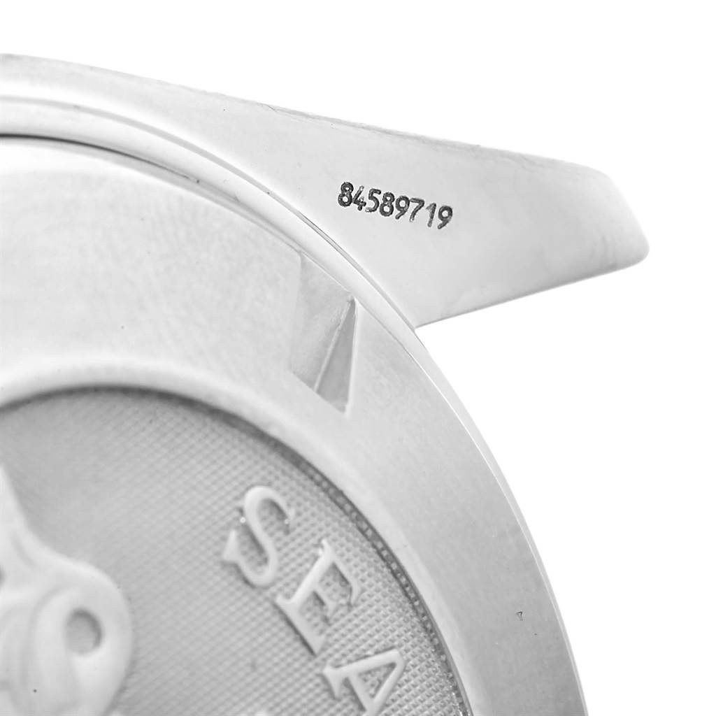 This image shows a close-up of the case back and lugs of the Omega Planet Ocean 2200.51.00 Men
s Stainless Steel Black Dial 2200.51.00 Men
s Stainless Steel Black Dial watch, highlighting the serial number and "SEA" engraving.