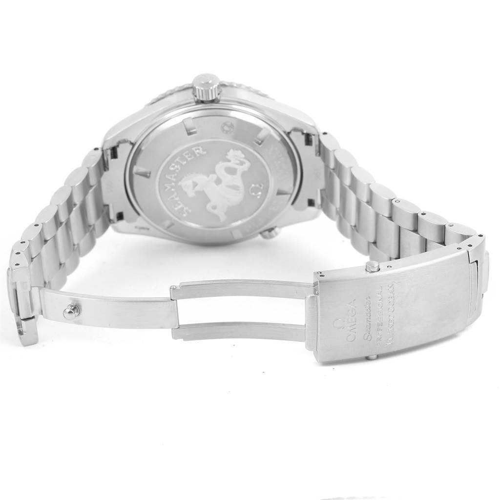 The image shows the back case and open clasp of an Omega Planet Ocean 2200.51.00 Men
s Stainless Steel Black Dial 2200.51.00 Men
s Stainless Steel Black Dial watch, showcasing its bracelet and engravings.