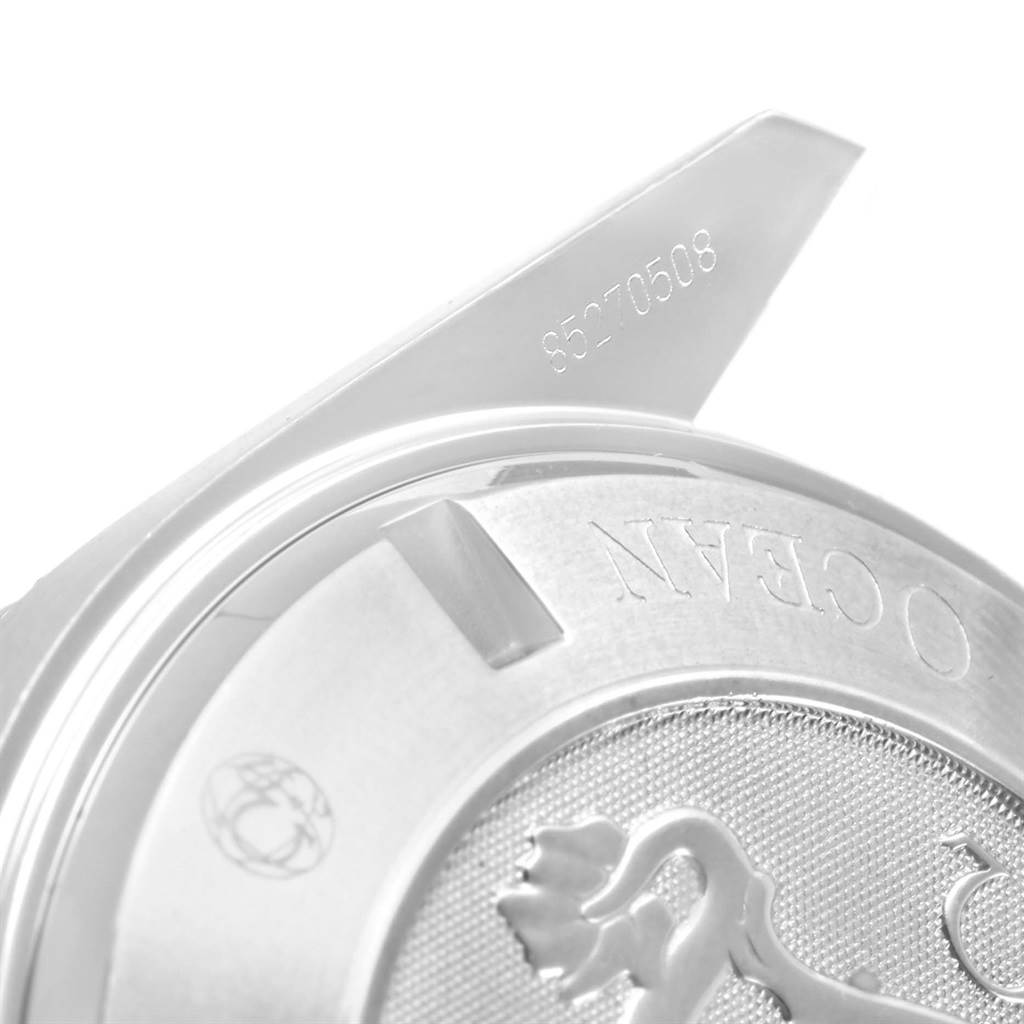 The image shows a close-up of the back case and bezel of the Omega Planet Ocean 2200.50.00 Men
s Stainless Steel Black Dial 2200.50.00 Men
s Stainless Steel Black Dial watch, highlighting engraving details.