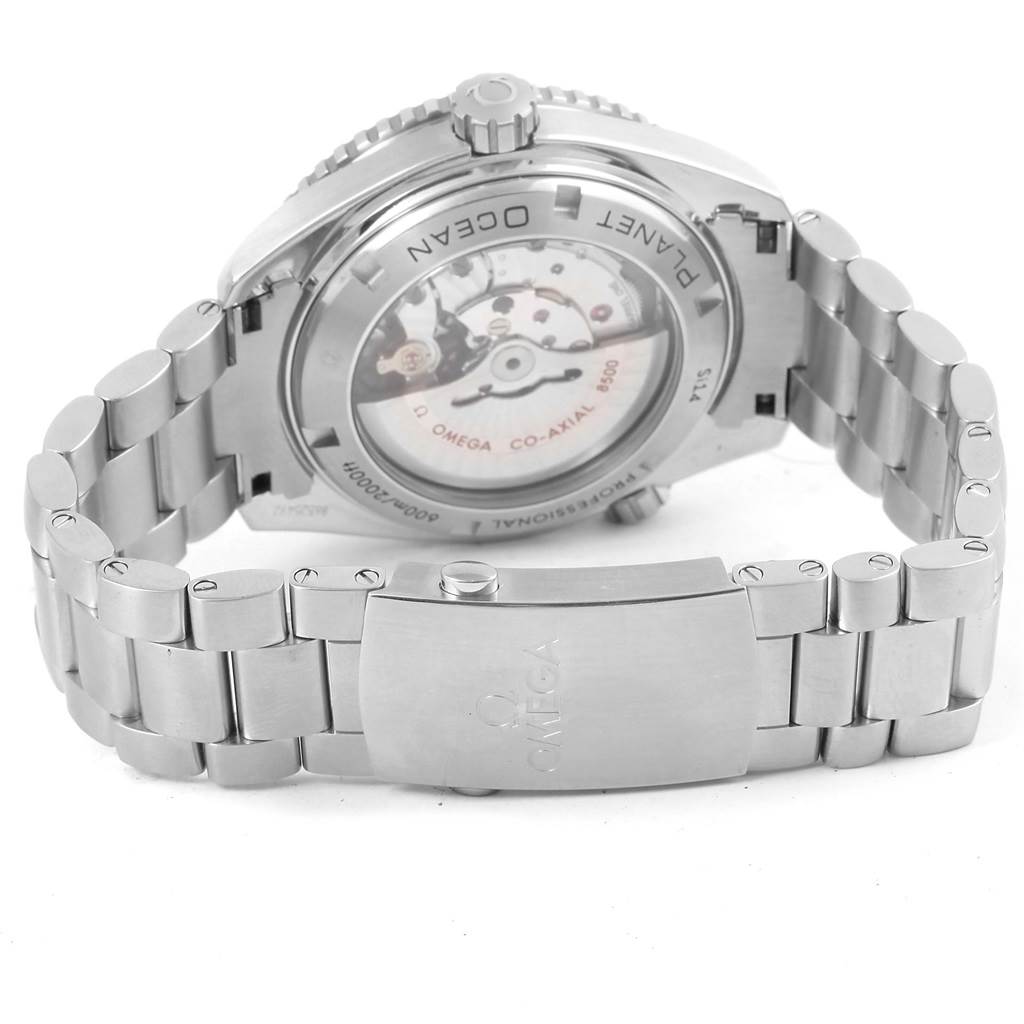 The image shows the back of an Omega Planet Ocean 232.30.46.21.01.003 Men's Stainless Steel Black Dial 232.30.46.21.01.003 Men's Stainless Steel Black Dial watch, focusing on the transparent case back and metal bracelet.