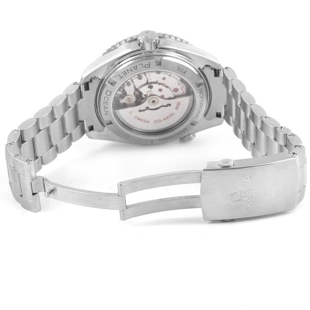 The image shows the back view and bracelet clasp of the Omega Planet Ocean 232.30.46.21.01.002 Men's Stainless Steel Black Dial 232.30.46.21.01.002 Men's Stainless Steel Black Dial watch, revealing the movement and branding.