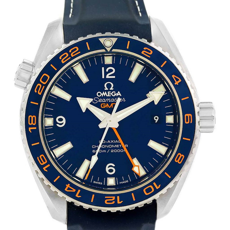 The image shows a front view of the Omega Planet Ocean Seamaster GMT watch, displaying the dial, bezel, and part of the strap.