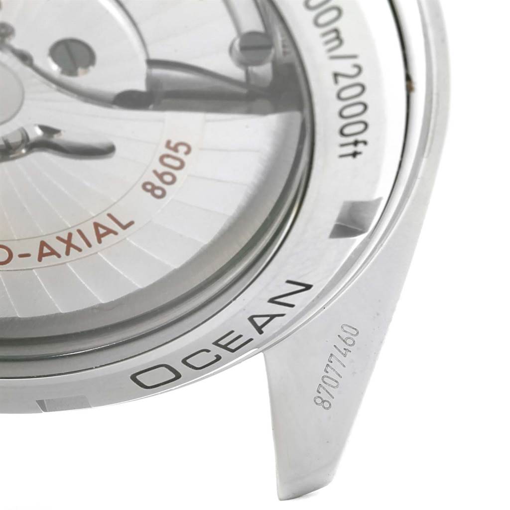 Close-up of the Omega Planet Ocean 232.32.44.22.03.001 Men
s Stainless Steel Blue Dial 232.32.44.22.03.001 Men
s Stainless Steel Blue Dial watch, showing part of the back casing with "OCEAN," depth rating, and part of the serial number.