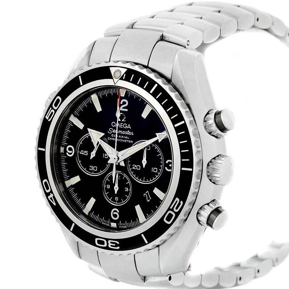 The Omega Planet Ocean 2210.50.00 Men
s Stainless Steel Black Dial 2210.50.00 Men
s Stainless Steel Black Dial watch is shown from a slight side angle, highlighting the bezel, face, and metal bracelet.