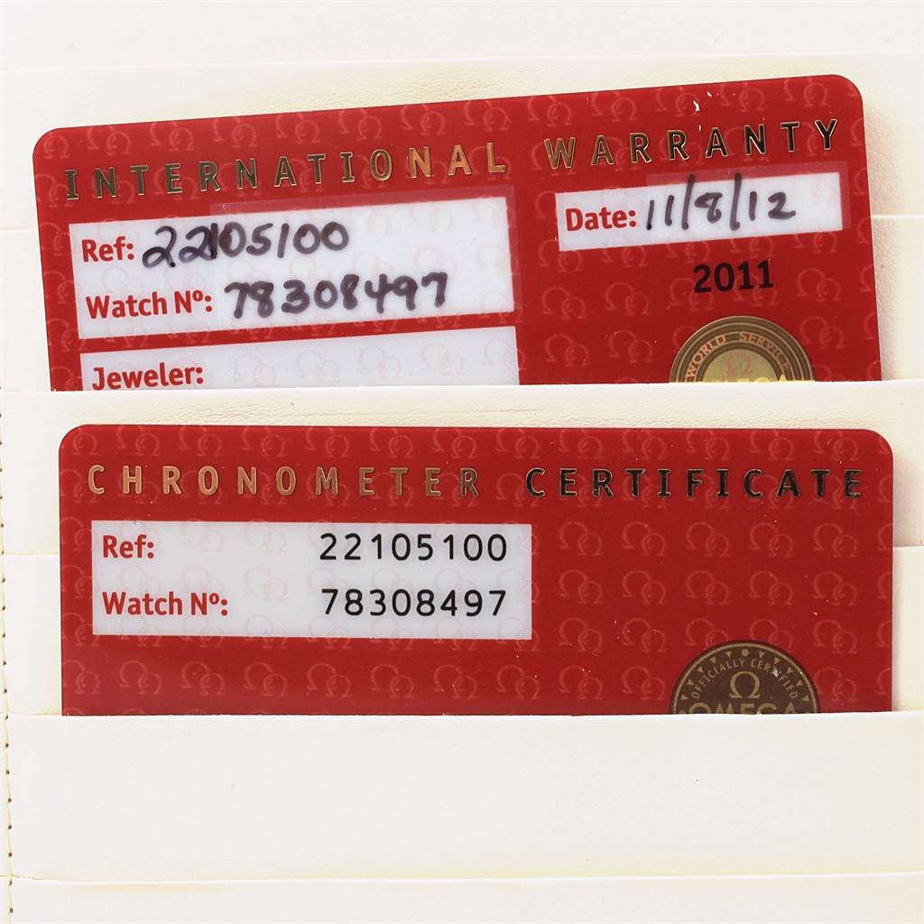 The image shows the International Warranty and Chronometer Certificate cards for the Omega Planet Ocean 2210.51.00 Men's Stainless Steel Black Dial 2210.51.00 Men's Stainless Steel Black Dial model.