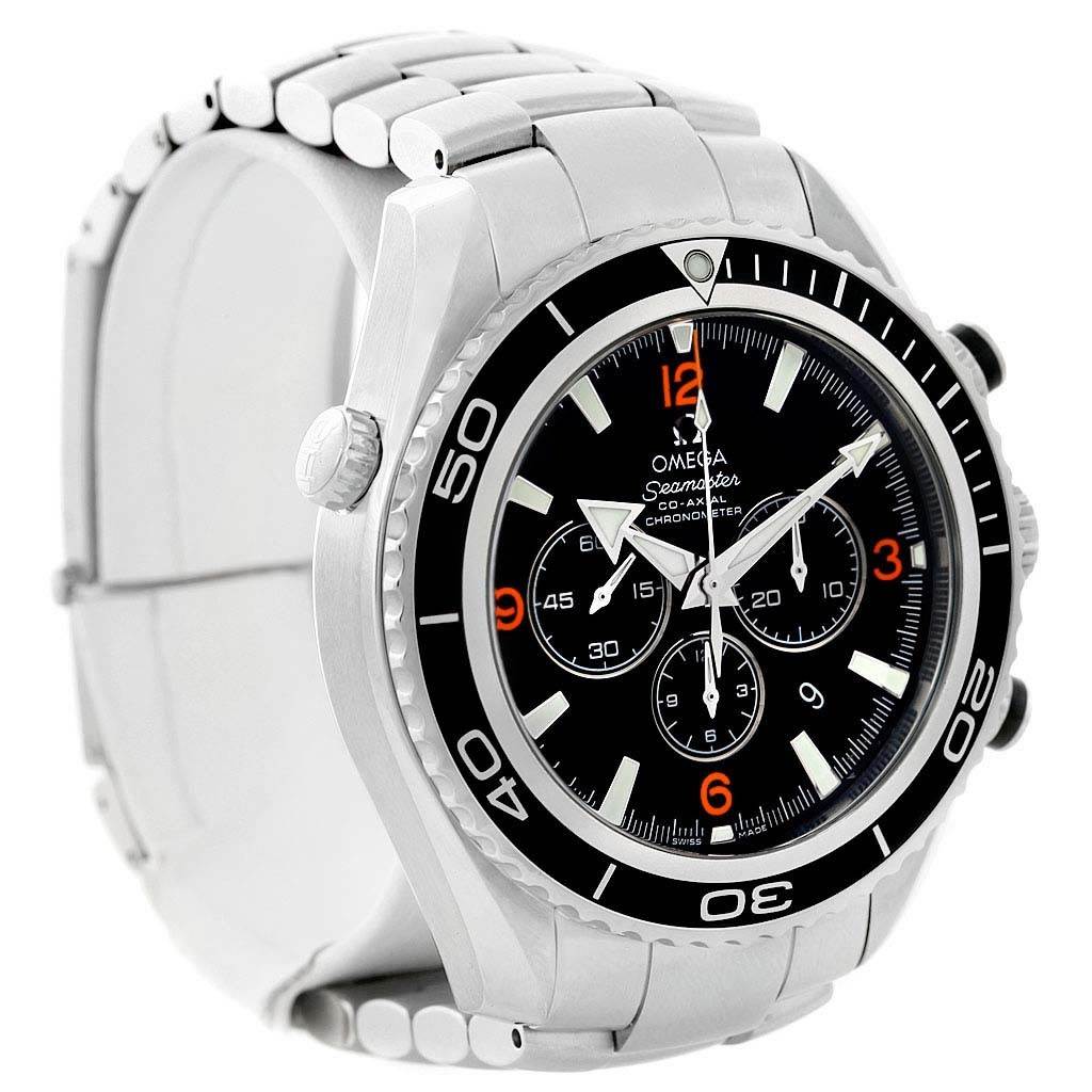 The image shows the Omega Planet Ocean 2210.51.00 Men's Stainless Steel Black Dial 2210.51.00 Men's Stainless Steel Black Dial watch from a left-side angle, highlighting its bezel, dial, and bracelet.