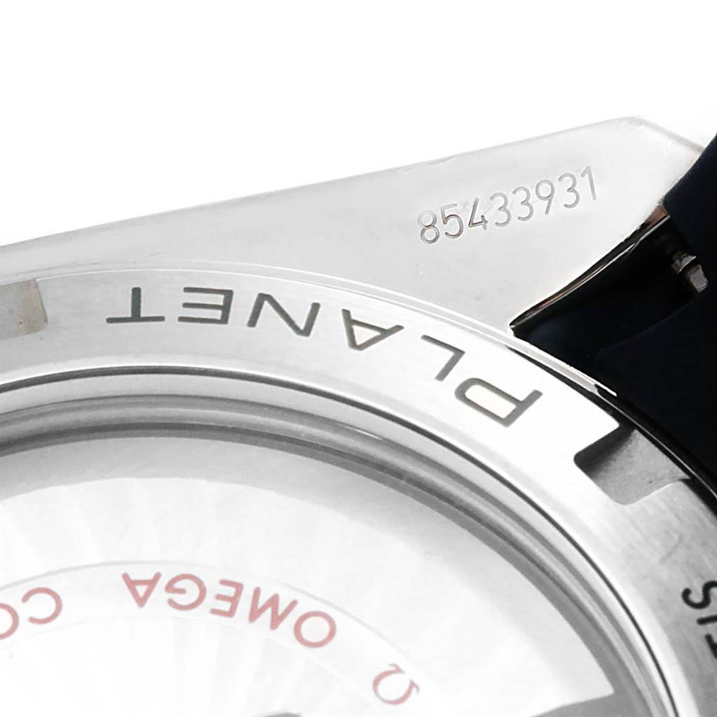 The image shows a close-up of the case back and serial number of the Omega Planet Ocean 232.92.42.21.03.001 Men's Titanium Blue Dial 232.92.42.21.03.001 Men's Titanium Blue Dial watch.