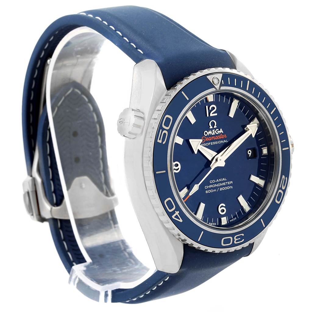 The Omega Planet Ocean 232.92.42.21.03.001 Men's Titanium Blue Dial 232.92.42.21.03.001 Men's Titanium Blue Dial watch is shown from a side angle, displaying the face, bezel, crown, and blue rubber strap.