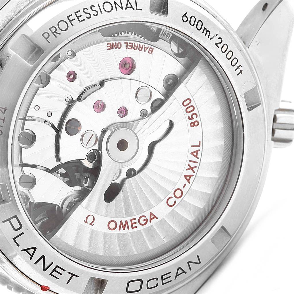 The image shows the back view of the Omega Planet Ocean 232.30.42.21.01.001 Men's Stainless Steel Black Dial 232.30.42.21.01.001 Men's Stainless Steel Black Dial watch, focusing on its Co-Axial 8500 movement.