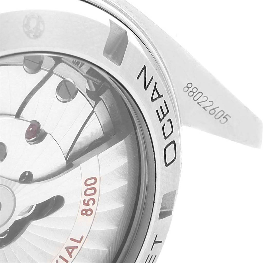 The image shows the back view of the Omega Planet Ocean 232.30.42.21.01.001 Men's Stainless Steel Black Dial 232.30.42.21.01.001 Men's Stainless Steel Black Dial watch, focusing on the Co-Axial 8500 movement and the watch's caseback.