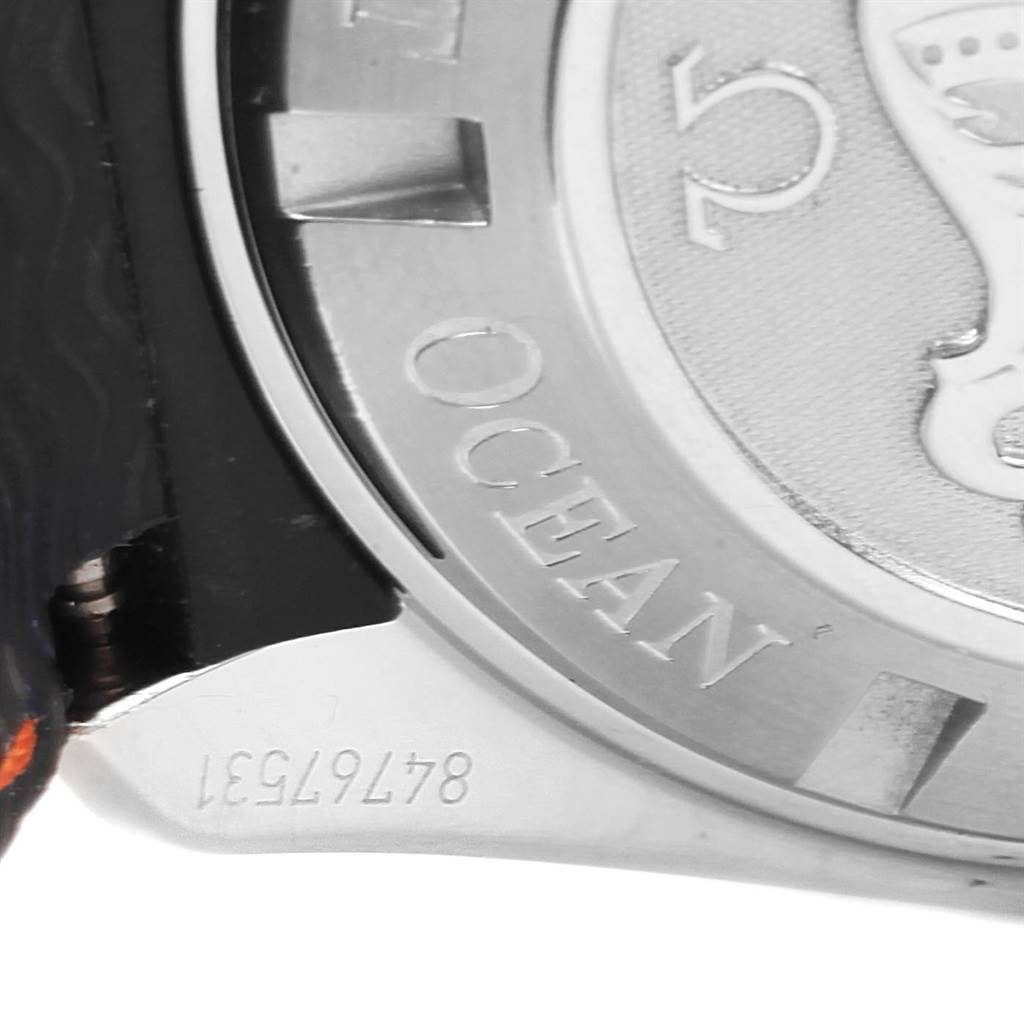 The image shows a close-up view of the side and back of the Omega Planet Ocean 2909.50.82 Men
s Stainless Steel Black Dial 2909.50.82 Men
s Stainless Steel Black Dial watch, highlighting the "OCEAN" engraving and part of the serial number.