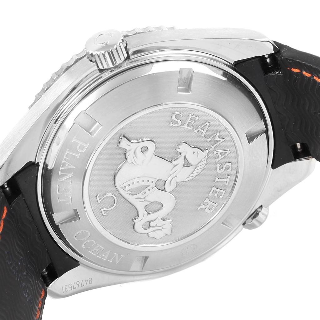 The image shows the back case of an Omega watch, Planet Ocean model, displaying the Seamaster logo.