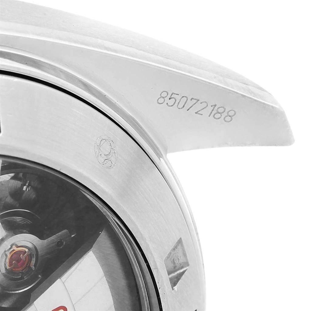 The image shows a close-up of the back case and serial number of the Omega Planet Ocean 232.30.46.51.01.001 Men's Stainless Steel Black Dial 232.30.46.51.01.001 Men's Stainless Steel Black Dial watch.