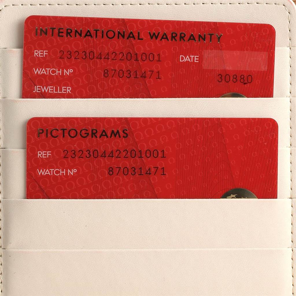 The image shows the international warranty and pictograms cards for the Omega Planet Ocean 232.30.44.22.01.001 Men
s Stainless Steel Black Dial 232.30.44.22.01.001 Men
s Stainless Steel Black Dial model, placed in a cardholder.