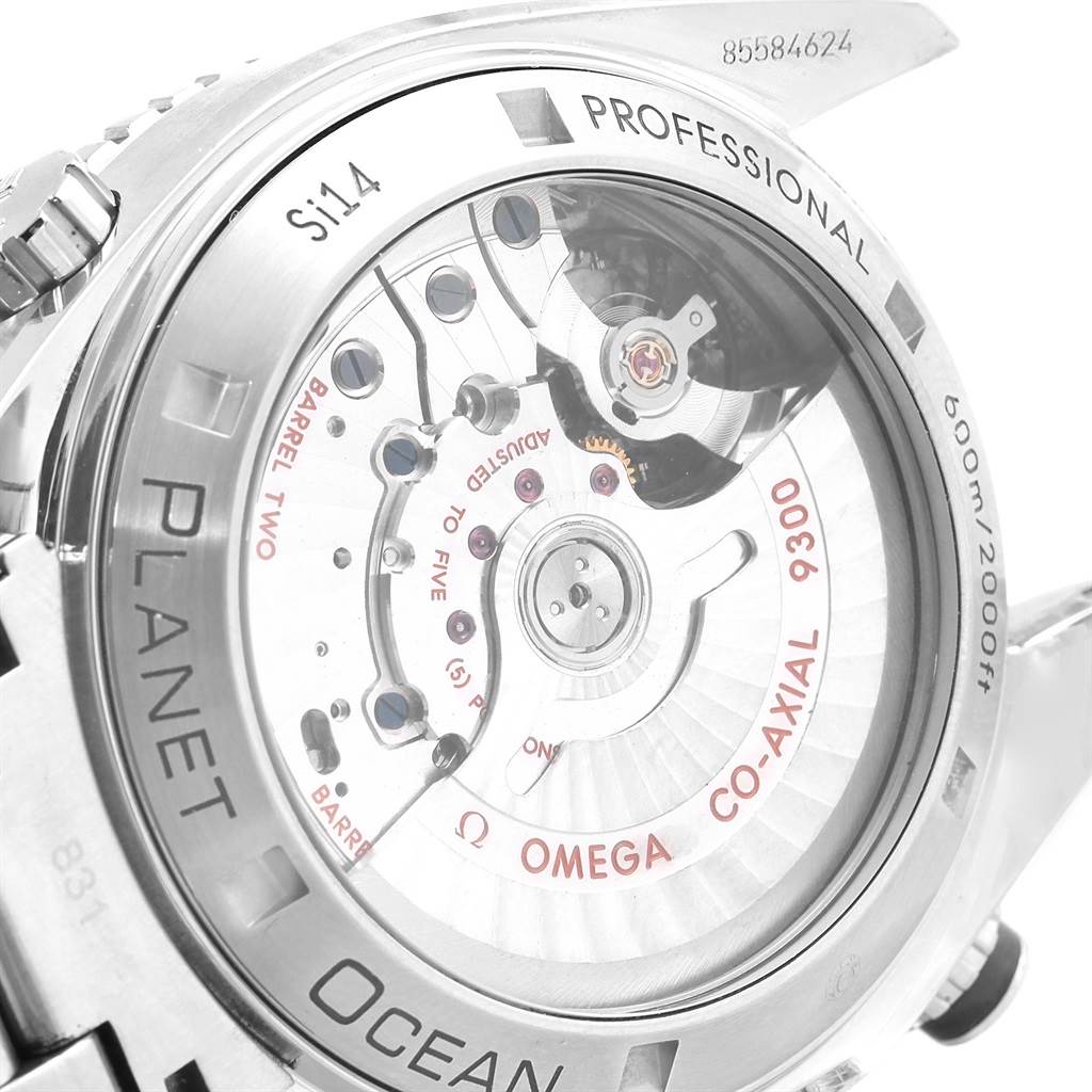 The image shows a close-up of the back case and internal mechanism of an Omega Planet Ocean 232.30.46.51.01.001 Men
s Stainless Steel Black Dial 232.30.46.51.01.001 Men
s Stainless Steel Black Dial watch.