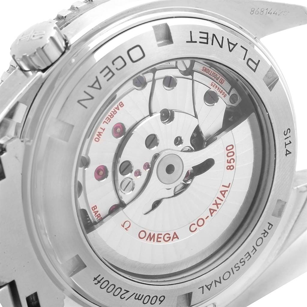 The image shows the back view of an Omega Planet Ocean 232.30.46.21.01.003 Men's Stainless Steel Black Dial 232.30.46.21.01.003 Men's Stainless Steel Black Dial watch, highlighting the Co-Axial 8500 movement.