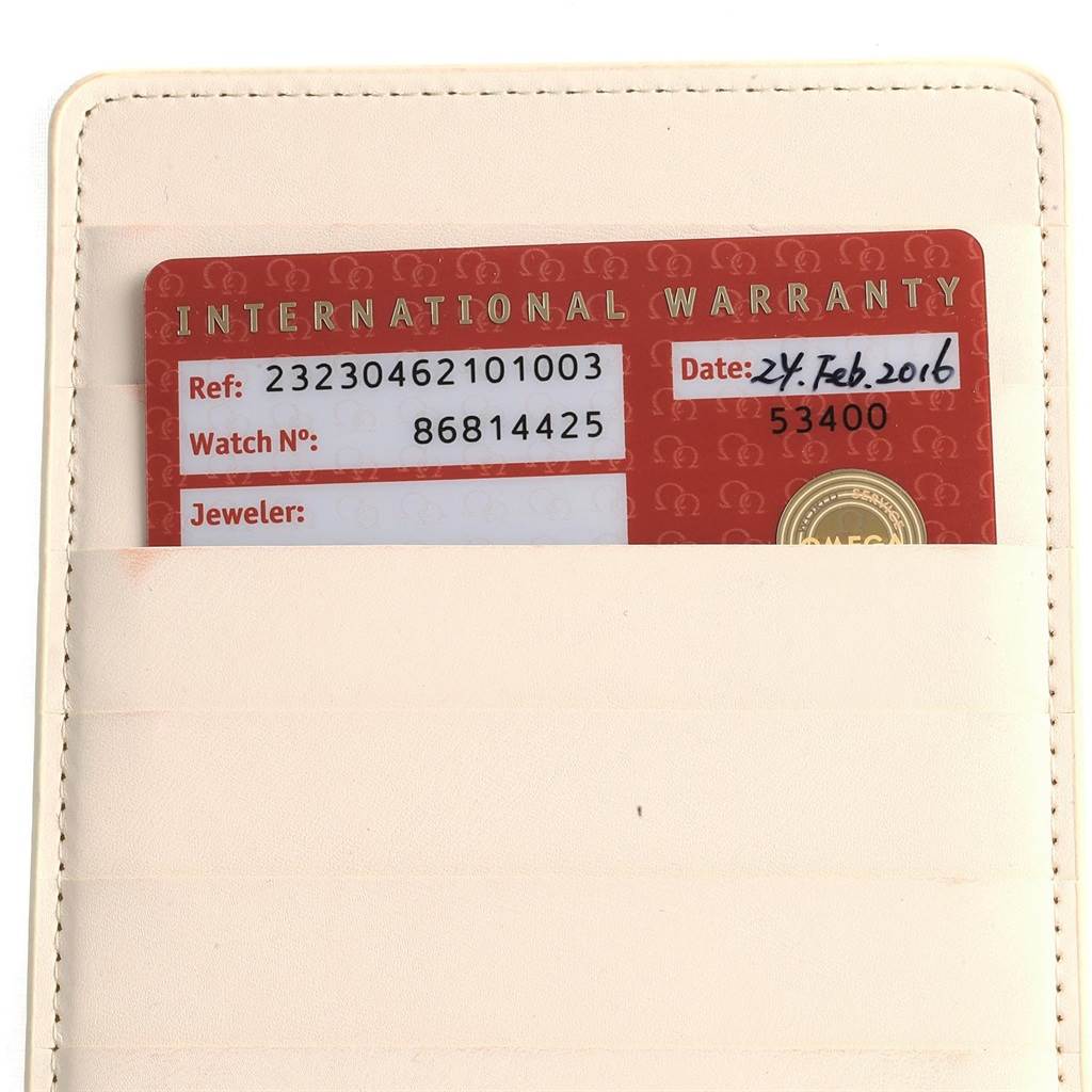 The image shows an Omega Planet Ocean 232.30.46.21.01.003 Men's Stainless Steel Black Dial 232.30.46.21.01.003 Men's Stainless Steel Black Dial model's red International Warranty card in a white sleeve.